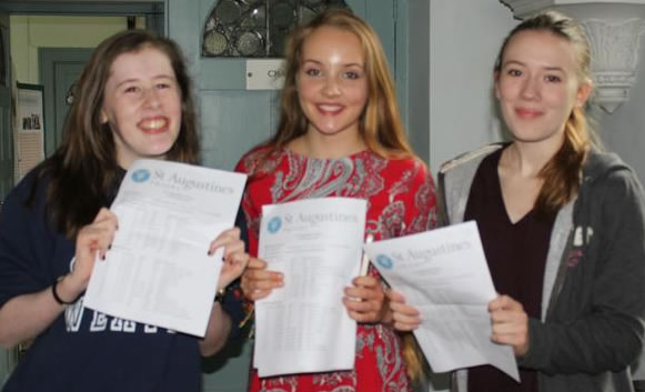 Rebecca Ball (9 A*s,3As), Monica Hanna (6 A*s, 4 As), and Claudia St Augustine's girls show off their exam results
